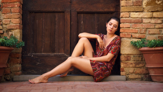 Woman sitting door olive skin free wallpaper - medium preview image