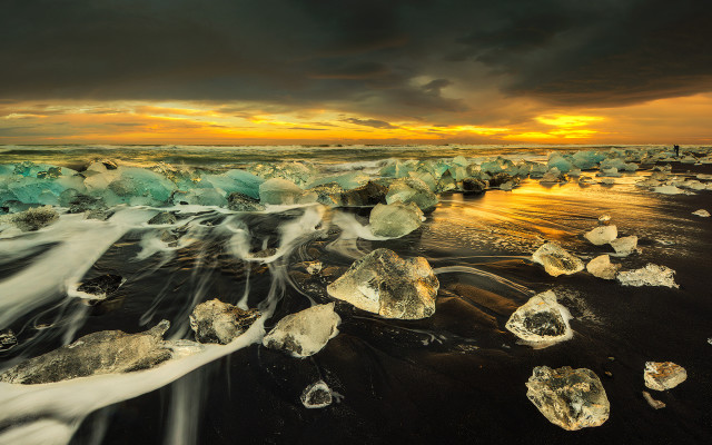 Ice beach waves sunset rocks free wallpaper - medium preview image