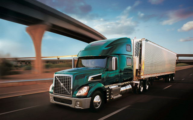 Green semi truck highway bridge free wallpaper - medium preview image