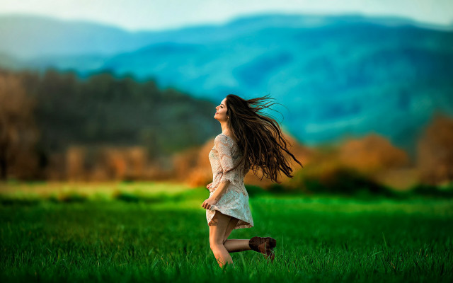 Woman field mountains wind blurry free wallpaper - medium preview image