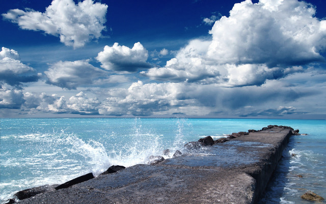 Long concrete wall ocean cloudy #2 free wallpaper - medium preview image
