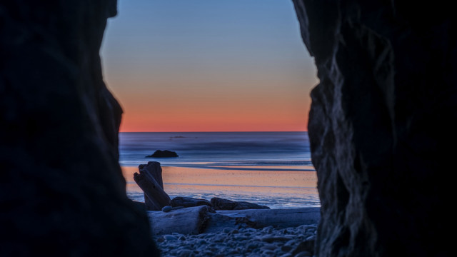 Beach cave sunset ocean boat free wallpaper - medium preview image