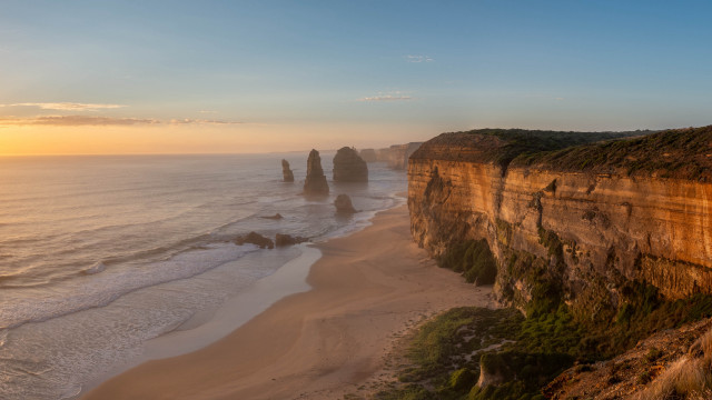 Beach cliff sunset ocean landscape free wallpaper - medium preview image