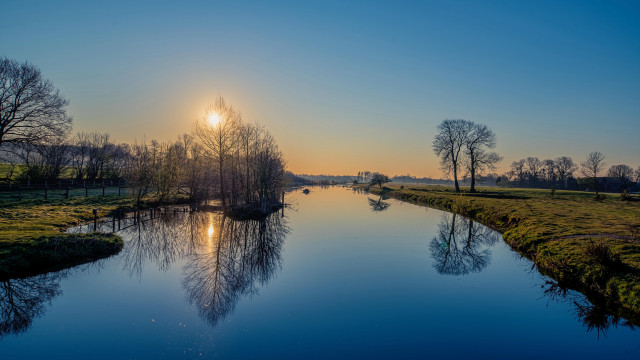 River sunset trees grassy field free wallpaper - medium preview image