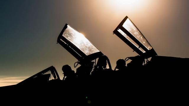 Group people vehicle silhouette backlighting free wallpaper - medium preview image