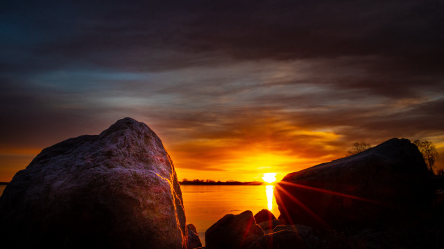 Sunset water rocks dark sky free wallpaper - medium preview image