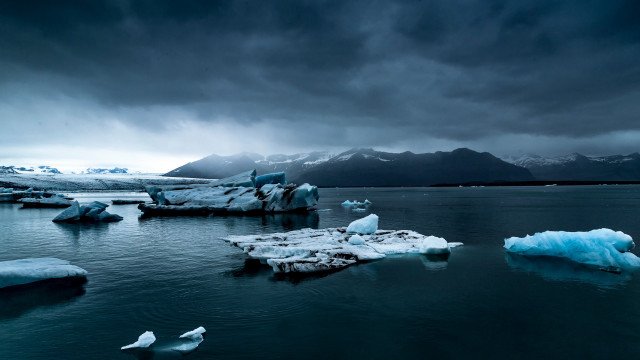 Icebergs water mountains clouds bird free wallpaper - medium preview image