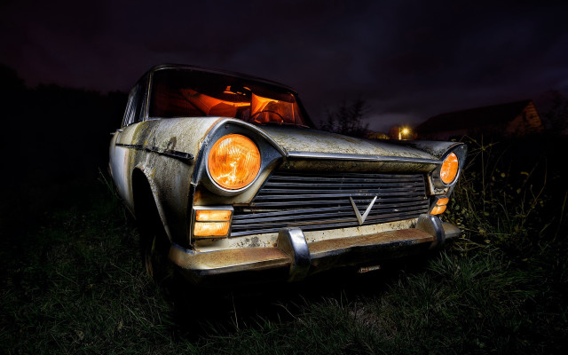 Car grass night lights photorealism free wallpaper - medium preview image