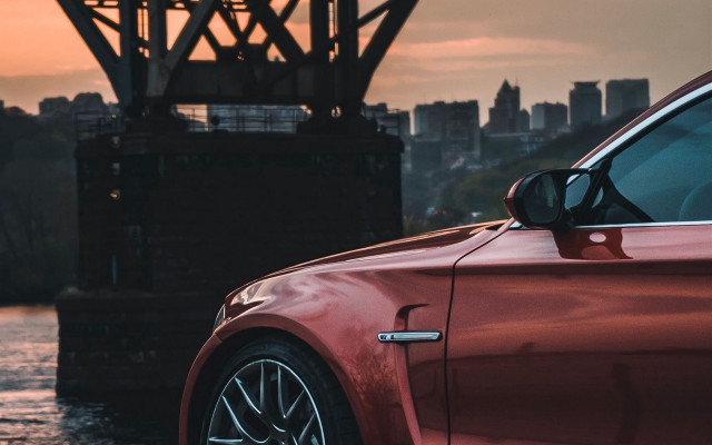 Red car bridge city sunset free wallpaper - medium preview image