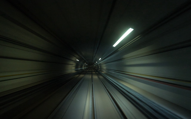 Futuristic train tunnel light person free wallpaper - medium preview image