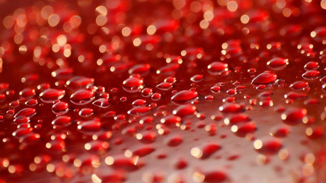 Red liquid water drops macro free wallpaper - medium preview image