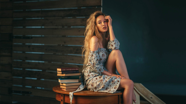 Woman sitting books floral dress free wallpaper - medium preview image