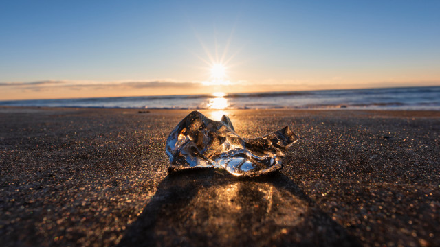 Glass beach sunset ocean light free wallpaper - medium preview image