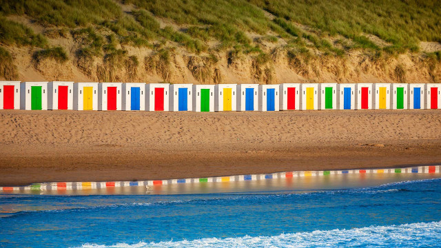 Beach colorful chairs cliff ocean free wallpaper - medium preview image