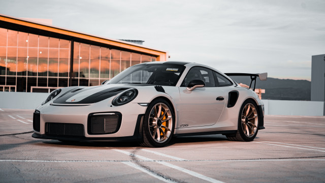 White porsche parking lot cubo free wallpaper - medium preview image