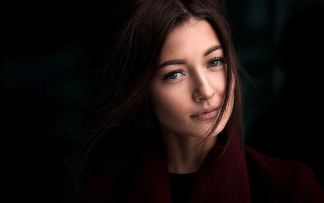 Woman red coat serious look #2 free wallpaper - medium preview image