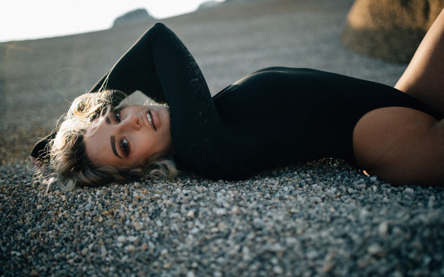 Woman black dress heels beach free wallpaper - medium preview image