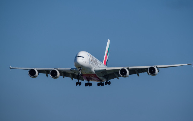 Large jetliner blue sky landing #3 free wallpaper - medium preview image