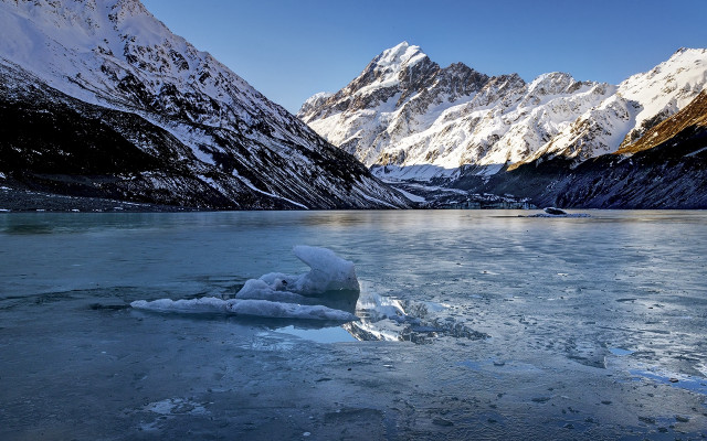 Mountain lake ice boat sky free wallpaper - medium preview image