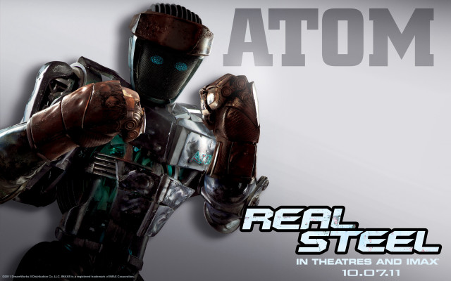 Robot holding gun real steel free wallpaper - medium preview image