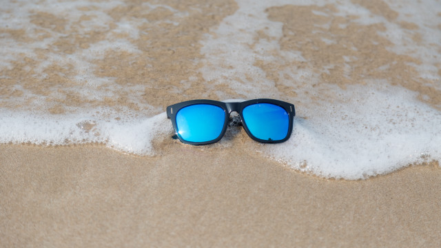 Sunglasses beach sand foam ocean free wallpaper - medium preview image