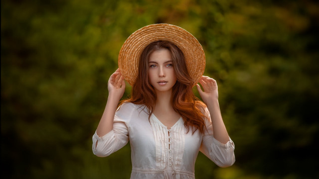 Woman strawhat field portrait blurry free wallpaper - medium preview image