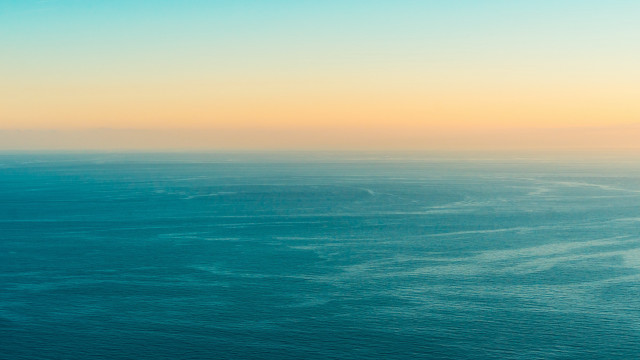 Ocean plane sunset minimalism tiltshift free wallpaper - medium preview image