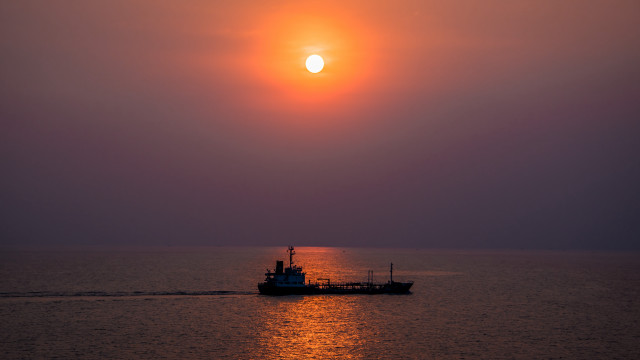 Boat sailing ocean sunset moon free wallpaper - medium preview image