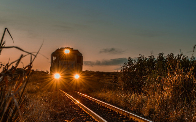 Train sunset lights flare silhouette free wallpaper - medium preview image