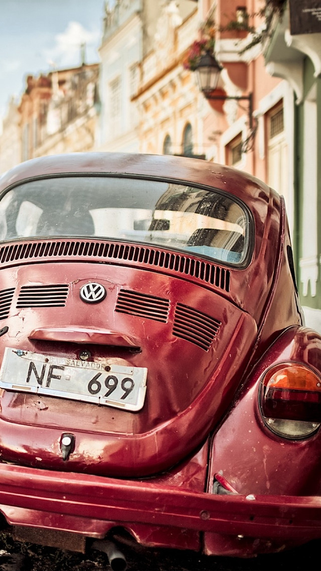 Red car parked road building #6 free wallpaper - medium preview image