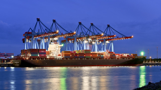 Cargo ship dock night lights free wallpaper - medium preview image