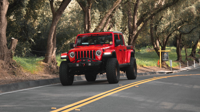 Red jeep forest road sunny free wallpaper - medium preview image
