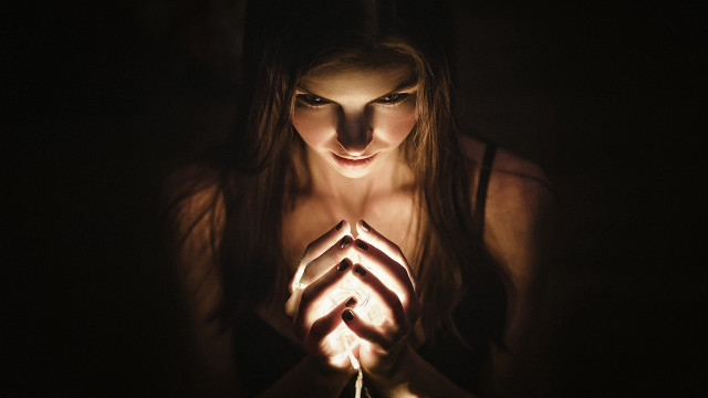 Woman holding string dark light free wallpaper - medium preview image
