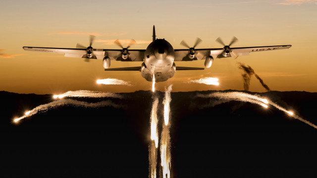 Airplane smoke sunset beach ocean free wallpaper - medium preview image