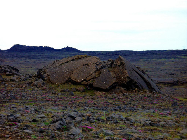 Large rock grass field mountain free wallpaper - medium preview image