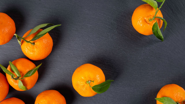 Oranges leaves table black background free wallpaper - medium preview image