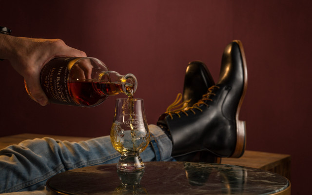 Man pouring whiskey glass vase free wallpaper - medium preview image