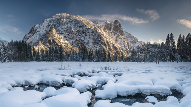 Snowy mountain range stream snow free wallpaper - medium preview image