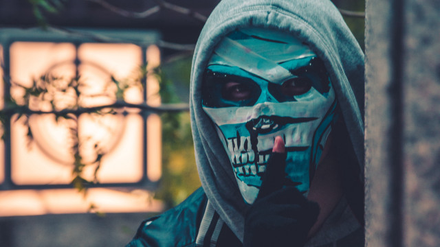 Painted face hood man cigarette free wallpaper - medium preview image
