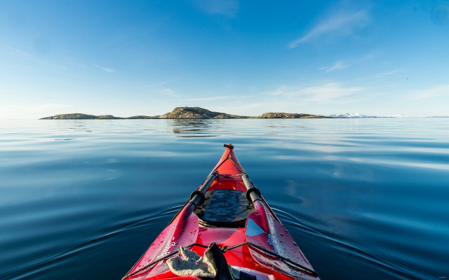 Red kayak island ocean sky free wallpaper - medium preview image