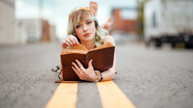 Woman reading blonde portrait bokeh free wallpaper - medium preview image