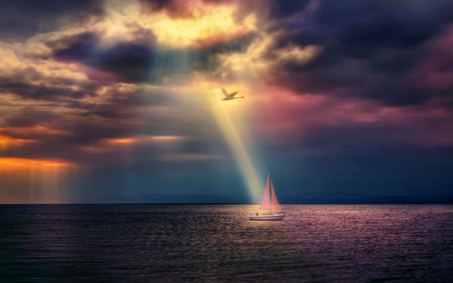 Sailboat cloudy sky light beam free wallpaper - medium preview image