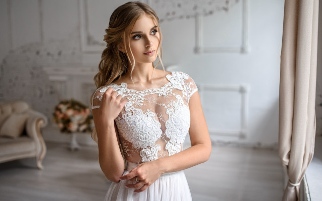 Woman white dress couch brown free wallpaper - medium preview image