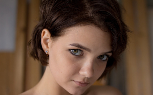 Serious woman blue eyes portrait free wallpaper - medium preview image