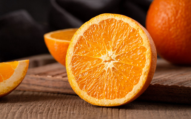 Orange closeup cuttingboard backgrounds blackcloth free wallpaper - medium preview image