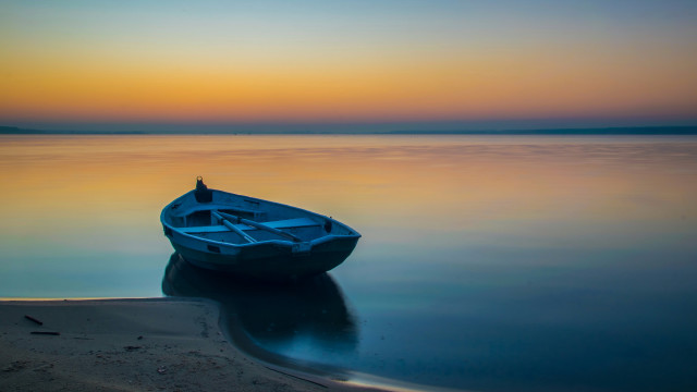 Small boat lake sunset reflection free wallpaper - medium preview image