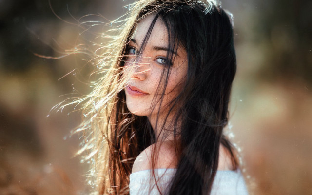 Woman longhair field blowing portrait free wallpaper - medium preview image