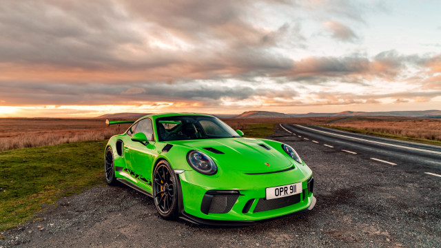 Green sports car sunset cloudy free wallpaper - medium preview image