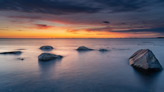 Sunset mountains water rocks clouds free wallpaper - medium preview image