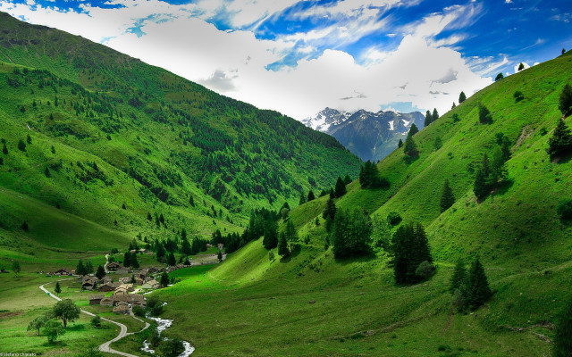 Green valley village mountains clouds #2 free wallpaper - medium preview image